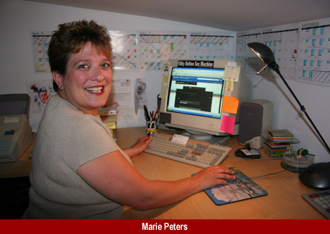 Marie Peters at her Administrative Workstation, providing individualized MySpace page Management